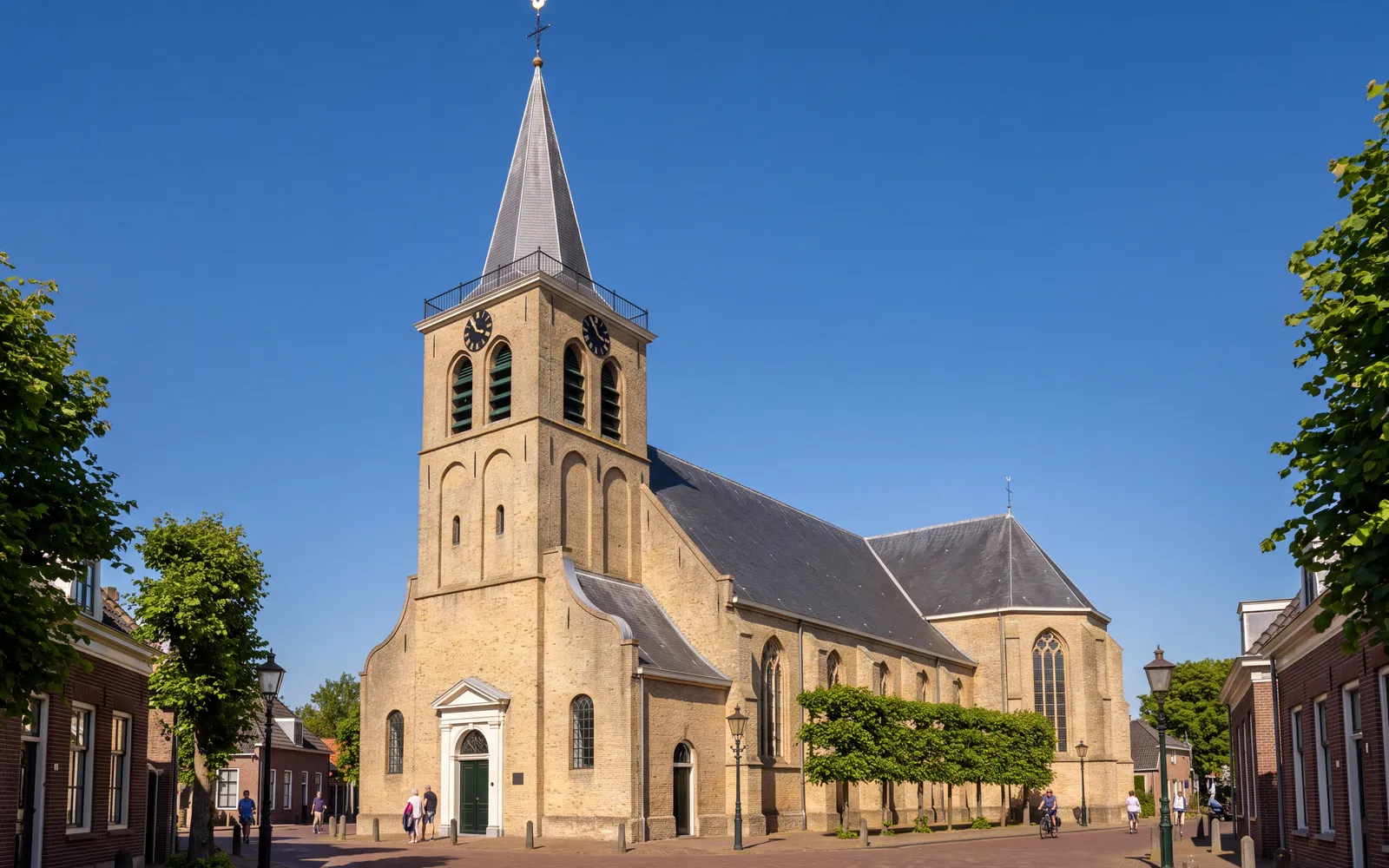 The village church in the old centre of Capelle aan den IJssel under a blue sky