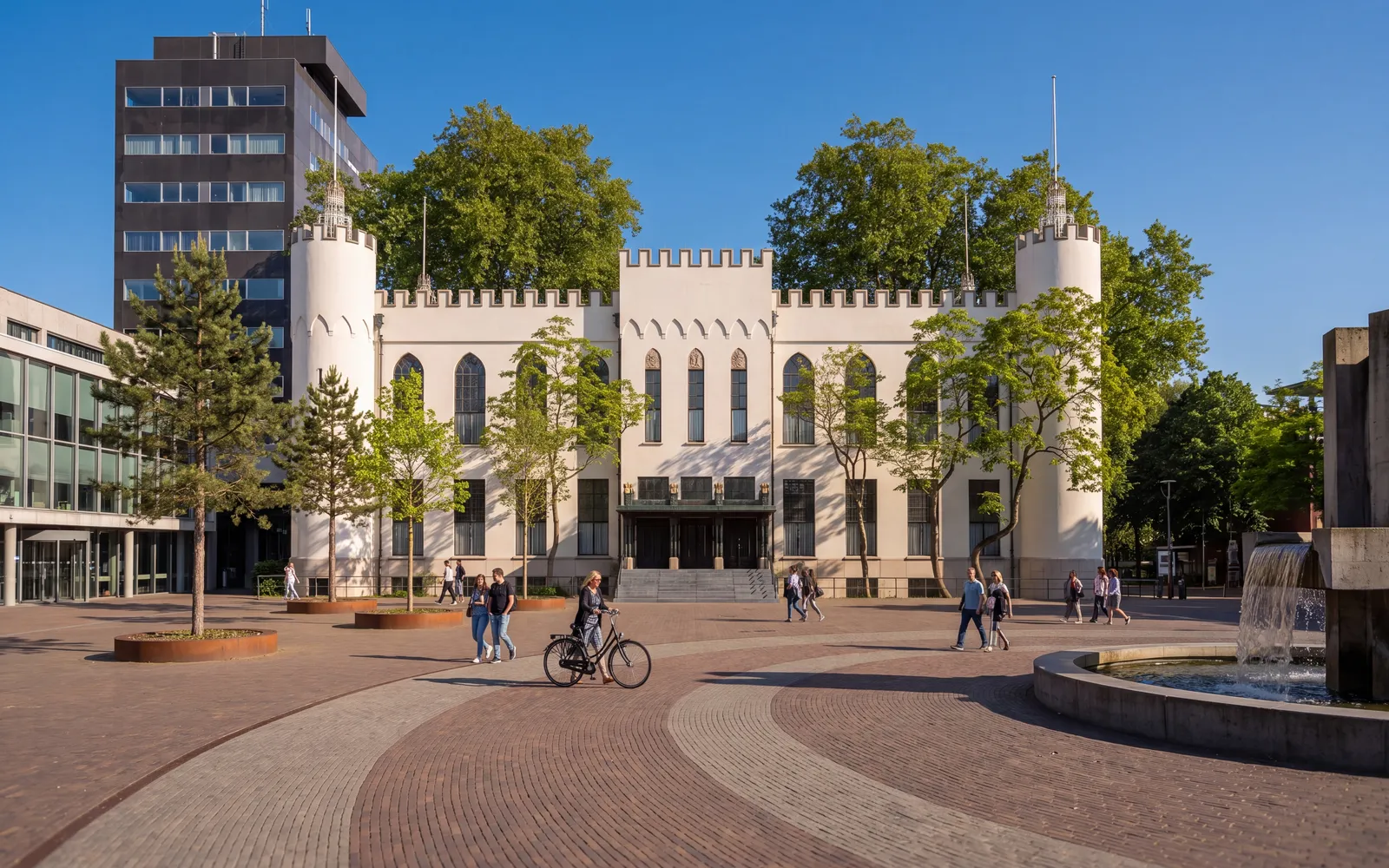 The white Paleis-Raadhuis on the Willemsplein in Tilburg under a blue sky